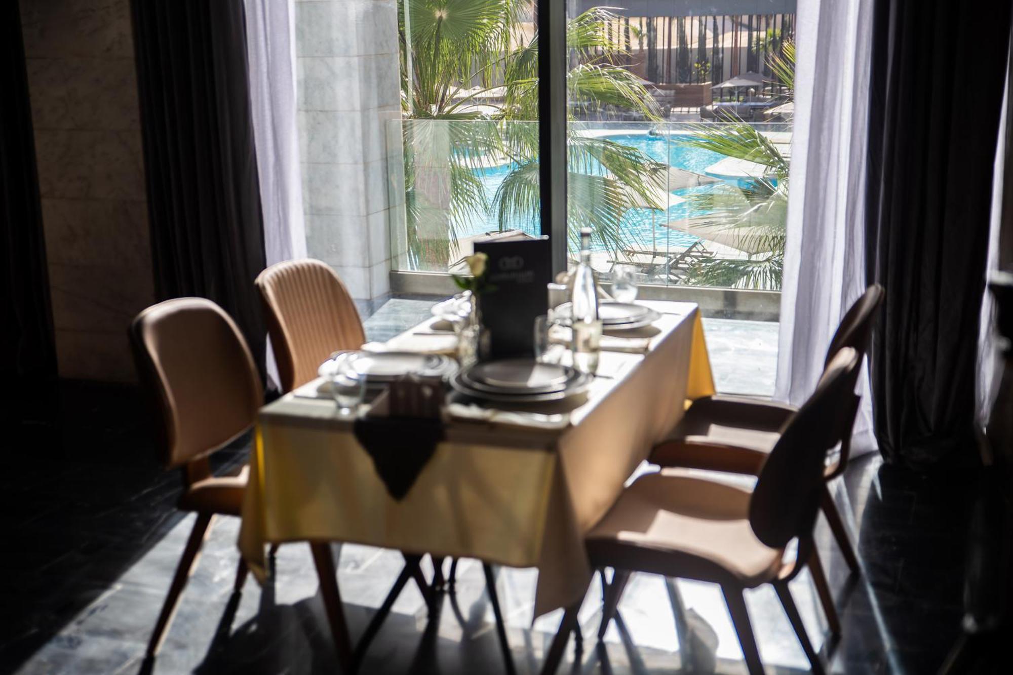 Dominium Palace Agadir Bagian luar foto A table set for four